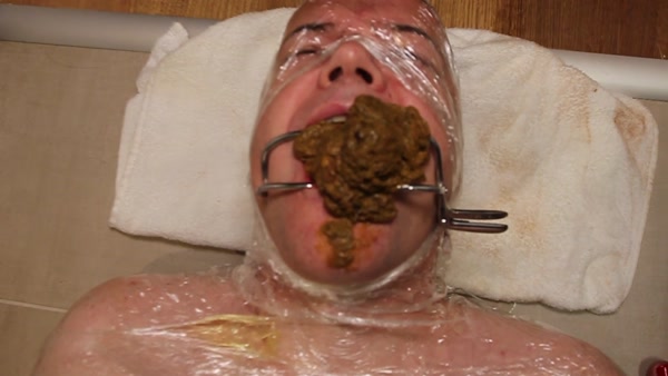 Click to play video A SSBBW takes a dump in a man's mouth. 