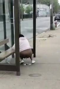 Click to play video Black woman shits in public