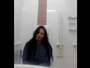 Click to play video Beautiful women taking a shit in public toilet