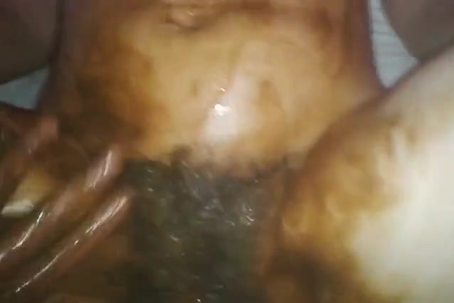 Click to play video Smearing Poop On Her Beautiful Hairy Pussy