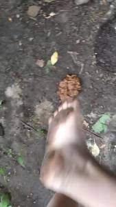 Click to play video Girl barefoot in shit