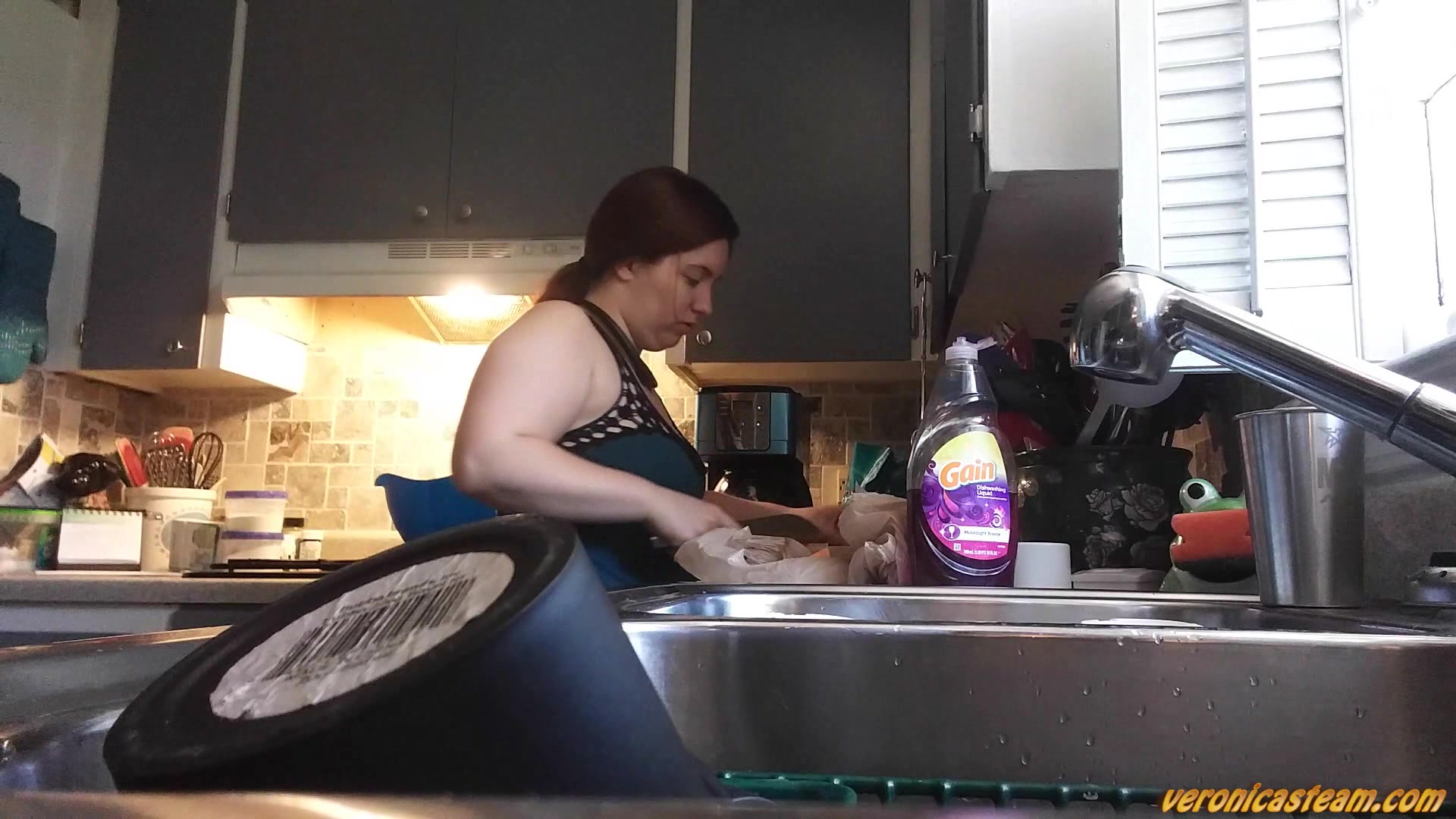 Click to play video Bathroom break during dinner prep