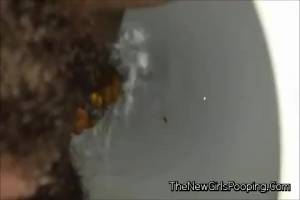 Click to play video Close view of an ebony shitting