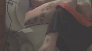 Click to play video Tattooed milf poops on toilet