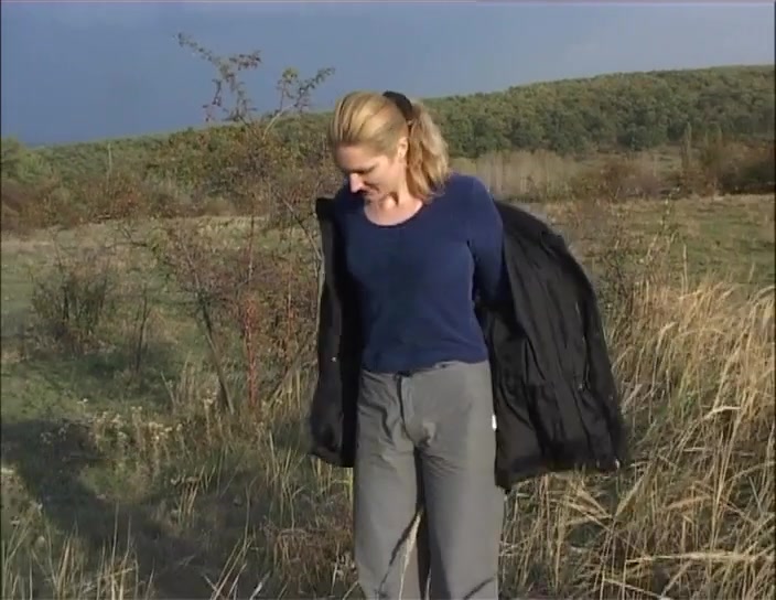 Click to play video shitting in an open field