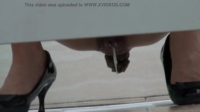Click to play video Sexy woman drops her jizz and a big turd in a public toilet!