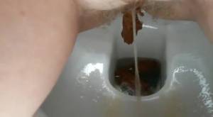 Click to play video Girl Shitting in Toilet - 5