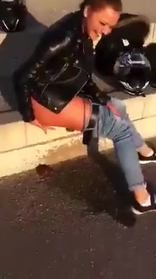 Click to play video Drunk girl pissing and shitting on the street