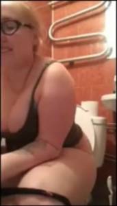 Click to play video Pretty blonde poops in toilet and replaces her black thong!