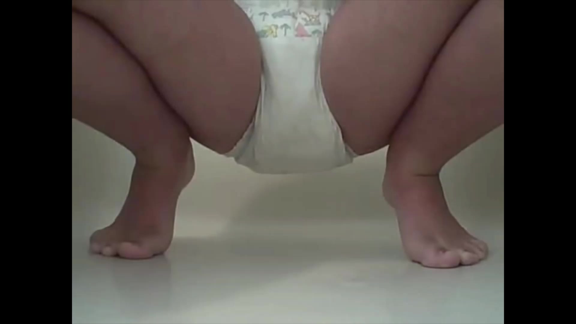Click to play video Girl Shits and Pisses Diaper and Shows Result