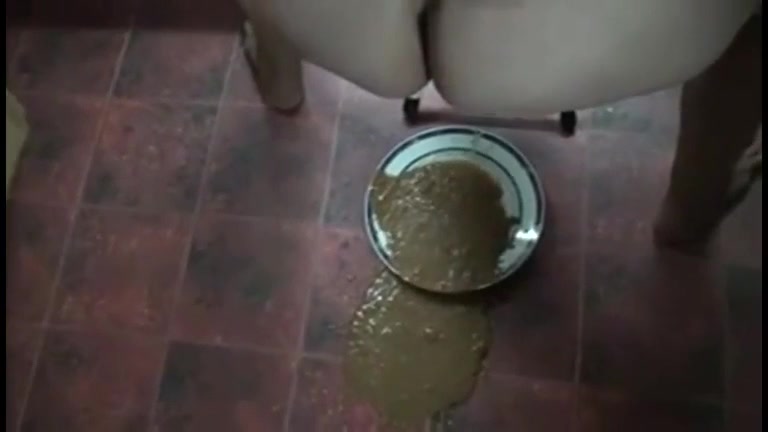 Click to play video MILF drops some hot poop soup