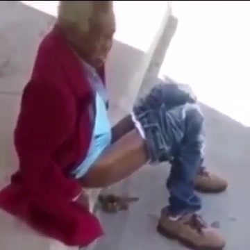 Click to play video Homeless Old Black Lady takes big shit on street