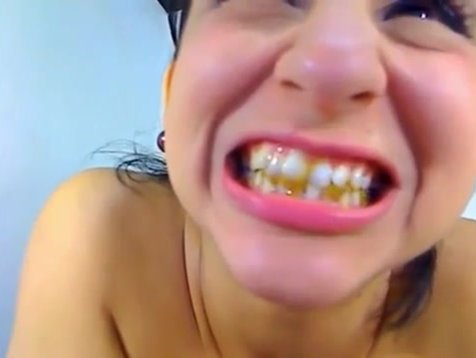 Click to play video A rising scat star plays with her girlfriend's shit in her mouth