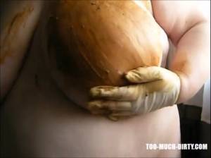 Click to play video Mature bbw smearing shit on her huge tits