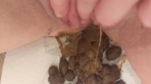 Click to play video Masturbating on soft turds close up