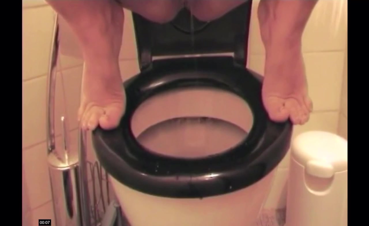 Click to play video Diarrhea over black toilet